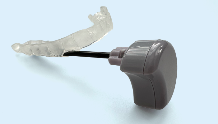 Zerene mouthguard and Moon Module on a blue background