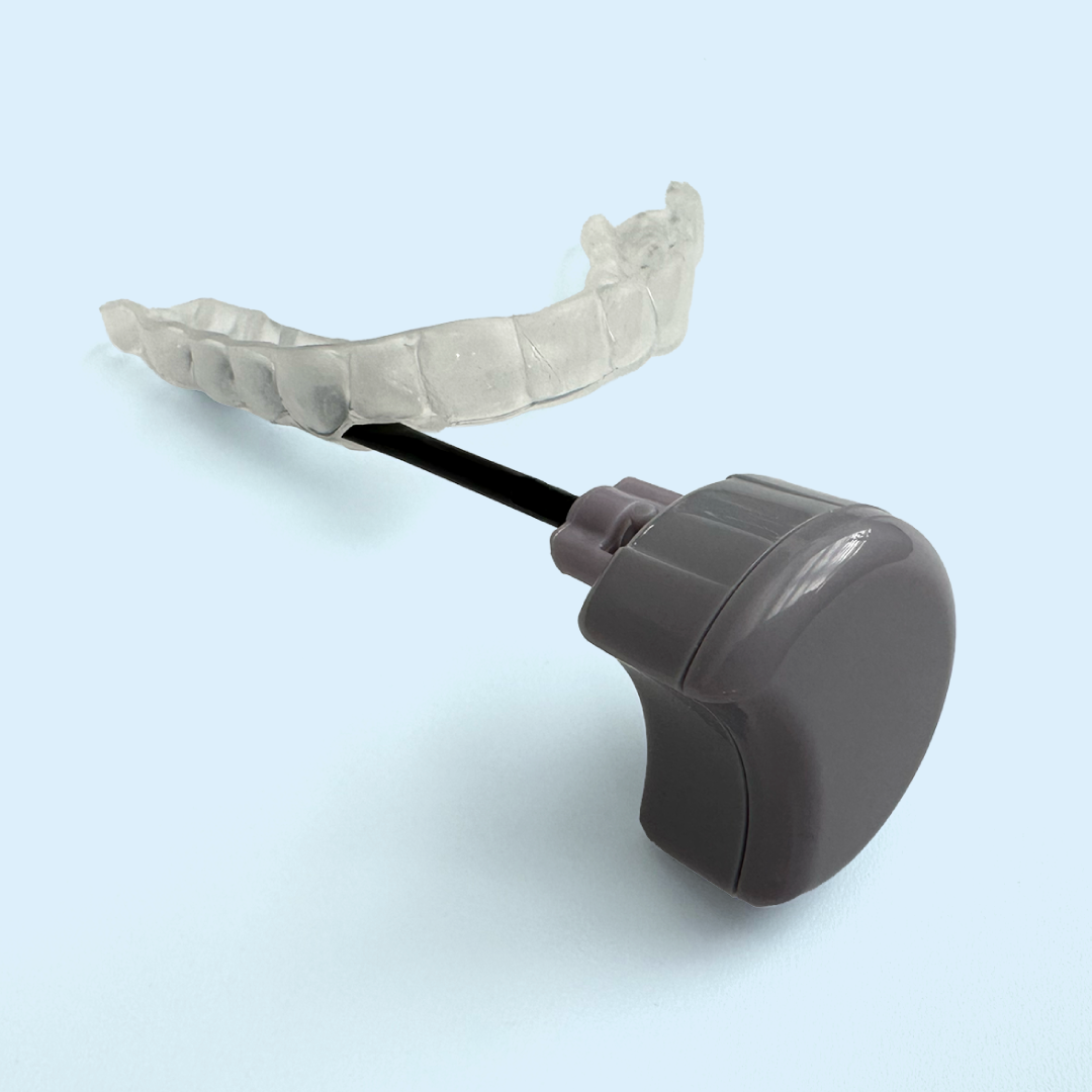 Zerene mouthguard and Moon Module on a blue background