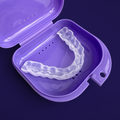 Zerene mouthguard in a purple case on a dark background
